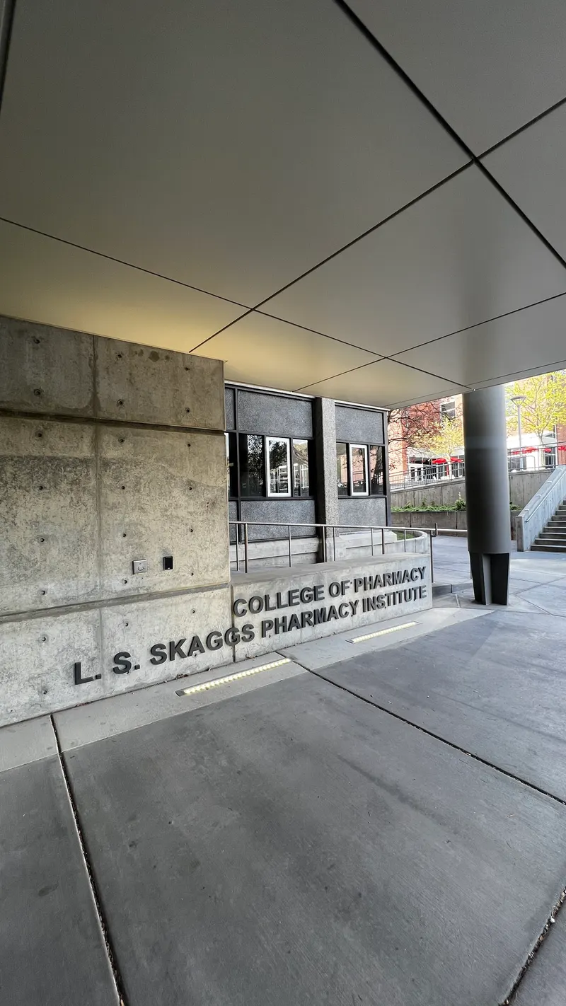 Exterior view of the concrete entrance building for the College of Pharmacy, L. S. Skaggs Pharmacy Institute.